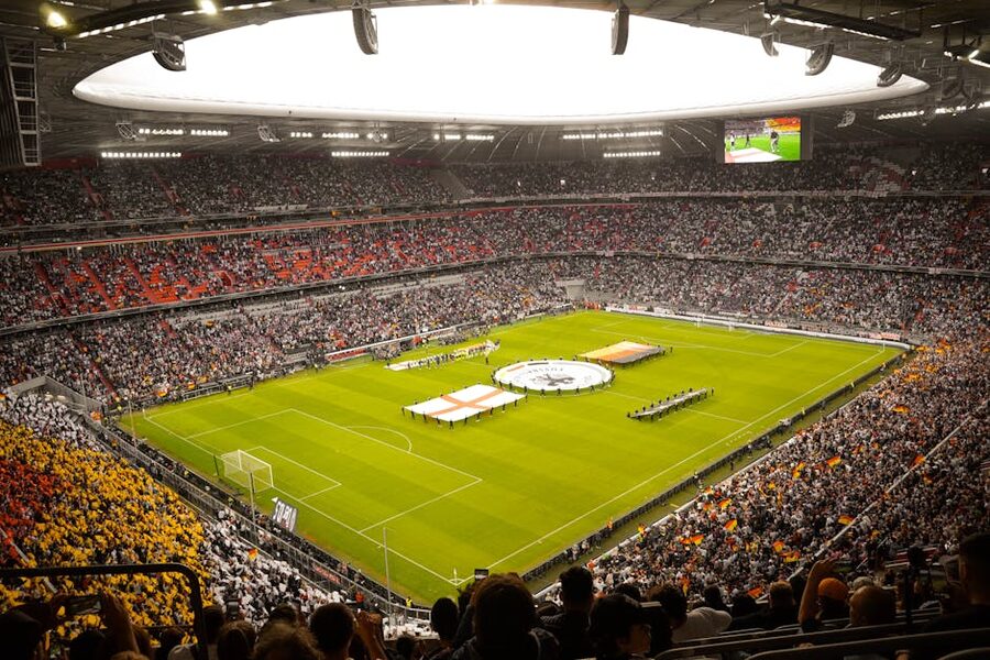 A packed stadium with fans during a soccer match