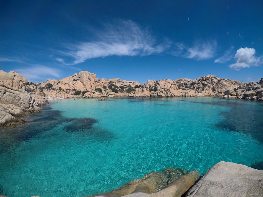La Maddalena turquoise water and granite boulders Sardinia