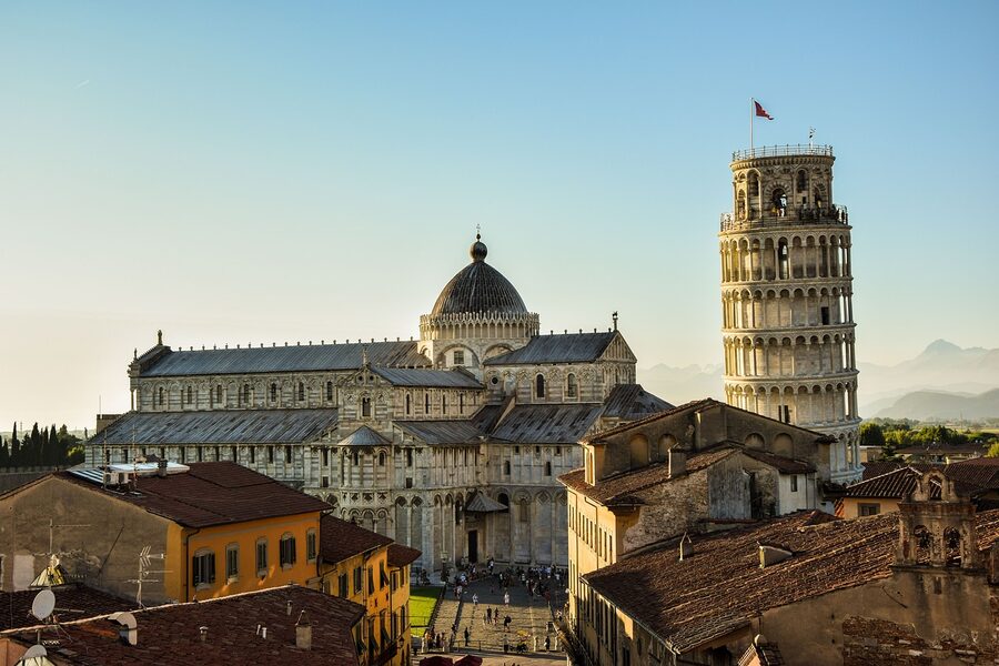 Leaning Tower of Pisa and the Pisa Cathedral on the green of Piazza dei Miracoli