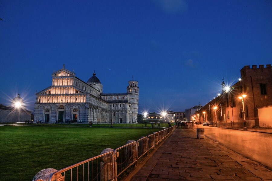 Side view of the Leaning Tower of Pisa with the Cathedral