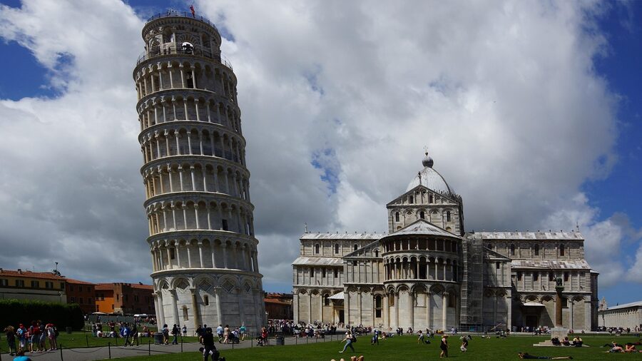 Close detail of the Leaning Tower of Pisa showing the marble columns and the tilt