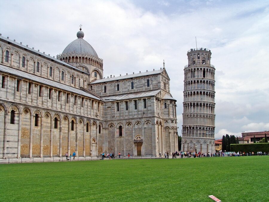 Tourists trying to take the classic forced-perspective lean-against-the-tower photo at Pisa