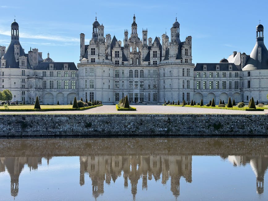 Chambord mirrored in tranquil water Loire Valley