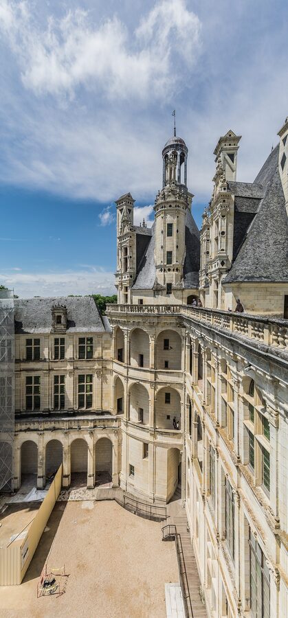 Chambord Castle rooftop detail with chimneys and cupolas