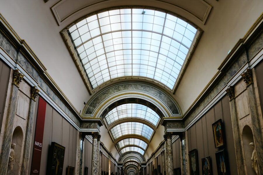 Louvre grand hallway with glass ceiling Paris