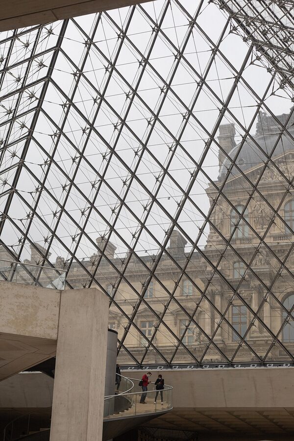 Spiral staircase descending from the Louvre Pyramid into the Hall Napoleon