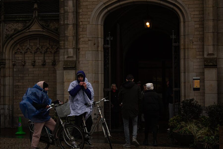 Cyclists on a rainy day in Amsterdam