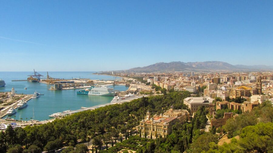 Aerial view of Malaga port and old town with Alcazaba visible