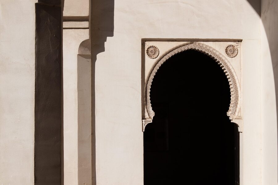 Sunlight through Islamic horseshoe arch in the Alcazaba Malaga
