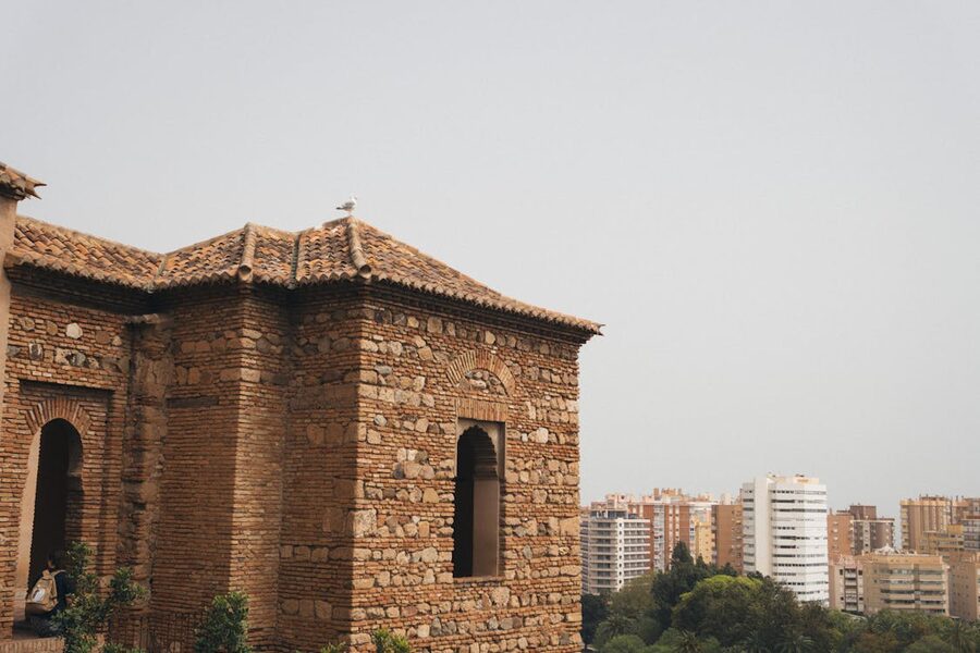 Alcazaba Malaga tower viewed against the modern cityscape