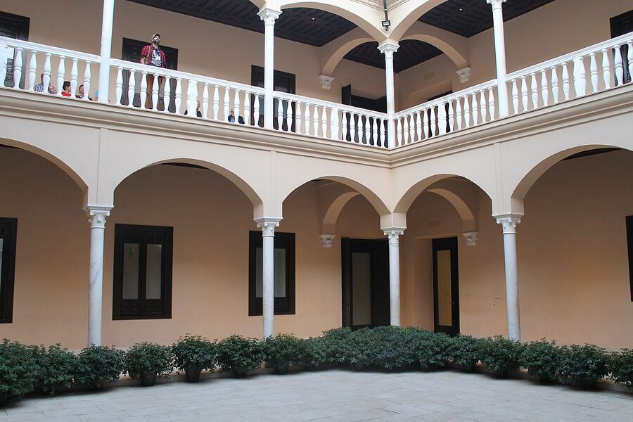 Inner courtyard of Museo Picasso Malaga with arched gallery walkways