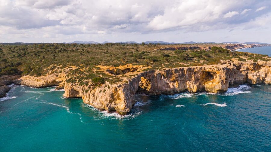 Turquoise water against Mallorca cliffs