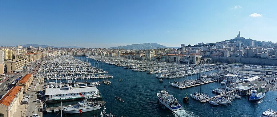 Marseille Vieux Port panorama with Notre Dame de la Garde on the hill