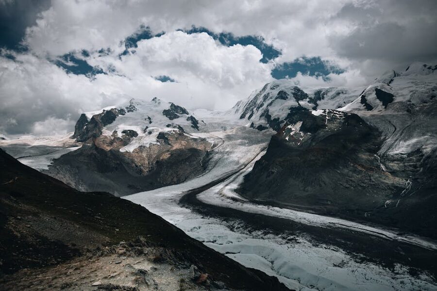 Mer de Glace glacier under cloudy sky in the French Alps