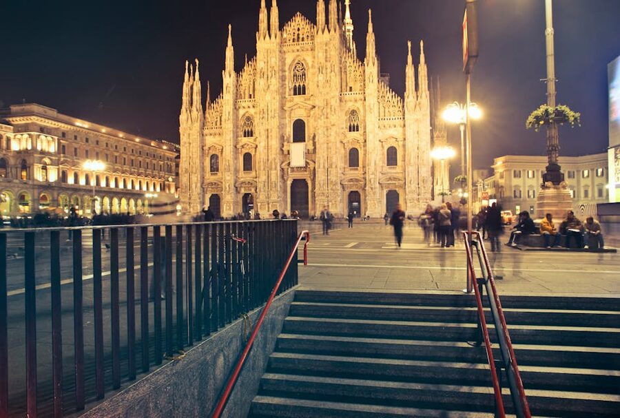 Milan Cathedral facade illuminated at night