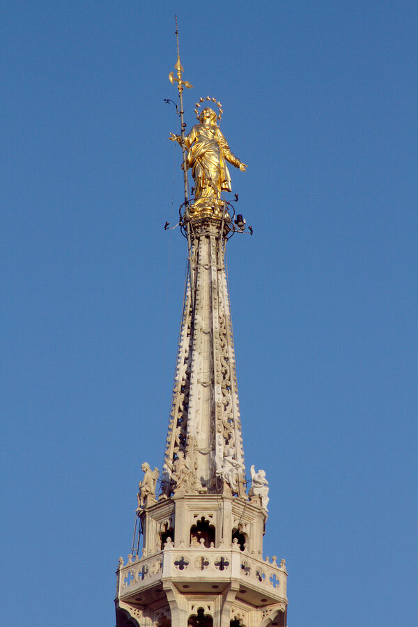 Madonnina statue on top of Milan Duomo spire