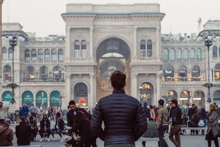 Crowd in Piazza del Duomo with Milan Cathedral behind