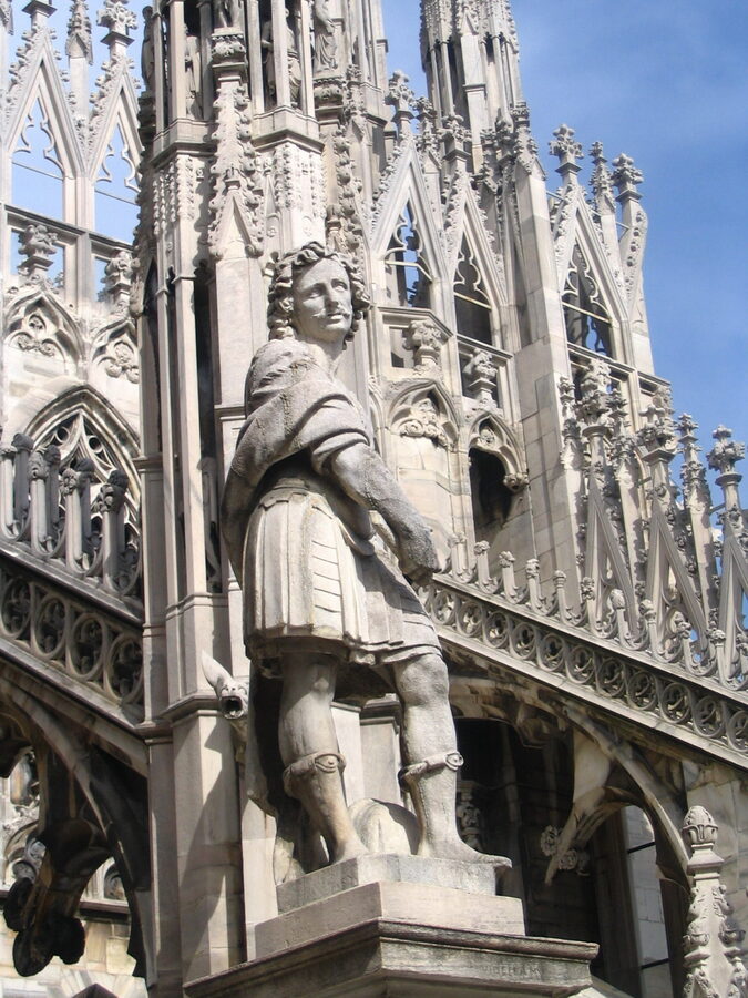 Detail of Milan Duomo roof with spires and statues