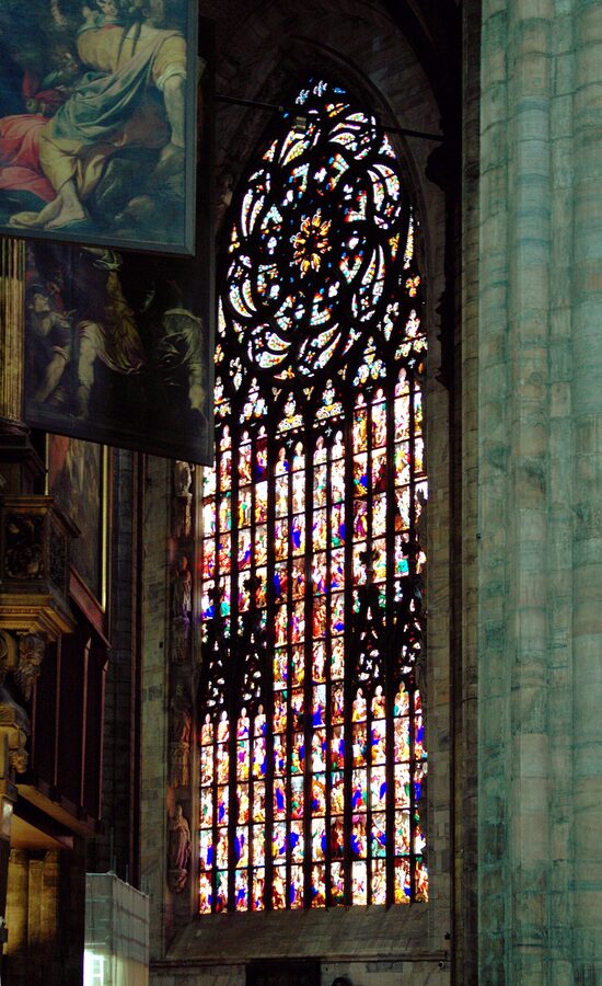 Stained glass window inside Milan Duomo