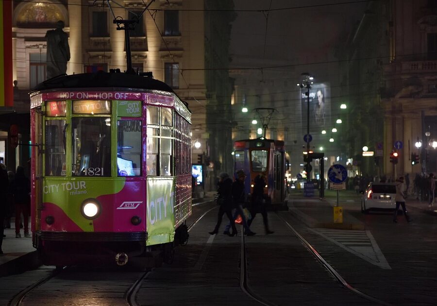 Milan tram by Piazza del Duomo at evening