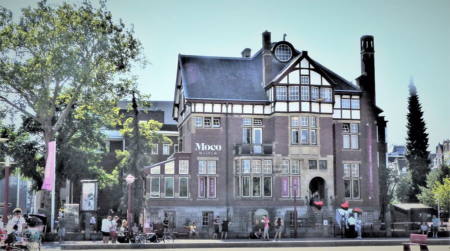 Moco Museum Amsterdam exterior with Banksy exhibition banner