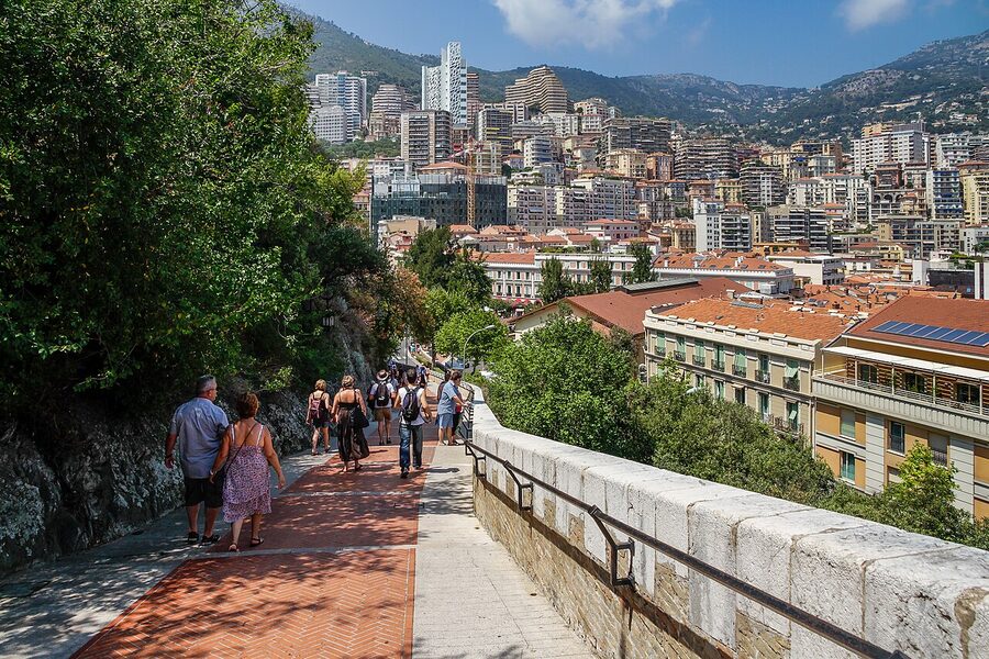 Path leading up to Le Rocher in Monaco-Ville with stone steps and Mediterranean view
