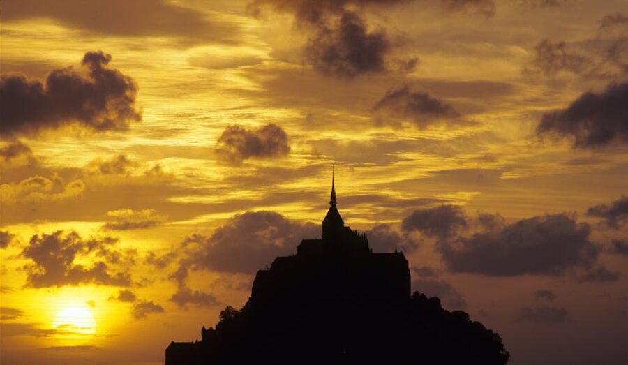 Mont-Saint-Michel silhouette at sunset