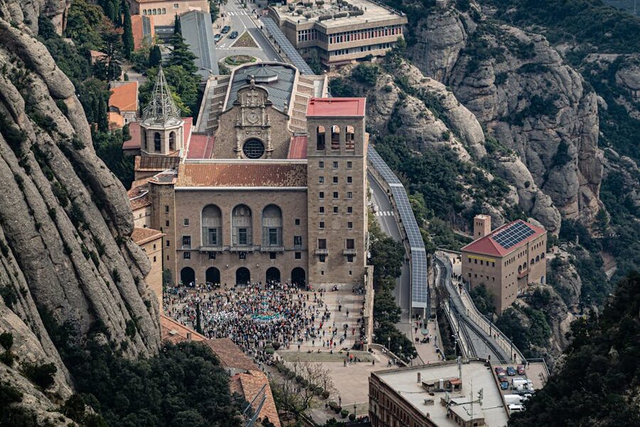 Aerial view of Santa Maria de Montserrat Abbey set among the rocky peaks of Catalonia