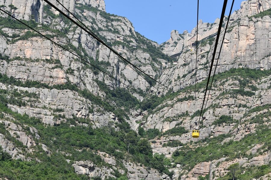 Cable car climbing the cliff face up to Montserrat