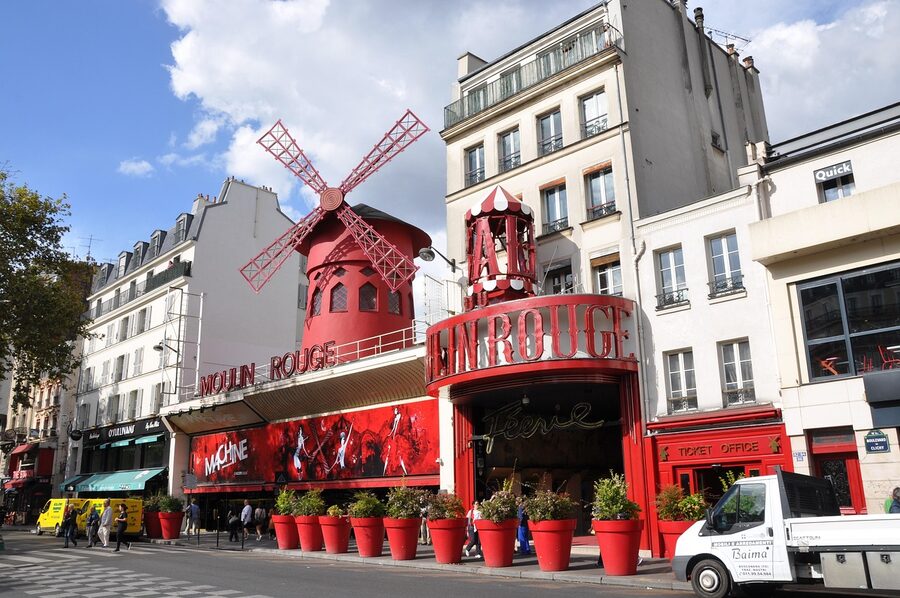 The Moulin Rouge cabaret entrance on Boulevard de Clichy at evening