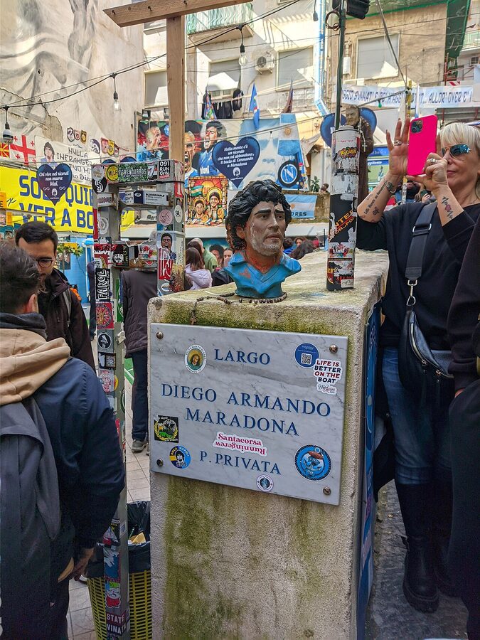 Largo Diego Armando Maradona plaque on wall in Quartieri Spagnoli