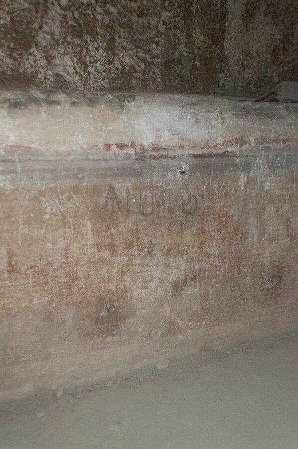 Underground tunnel wall with the historic water line in Naples