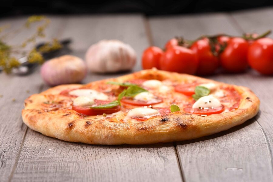 Naples margherita pizza with mozzarella basil tomato