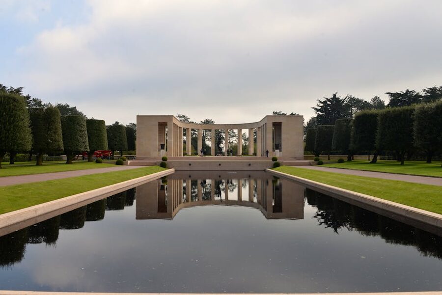 The reflective pool and statue at the Normandy American Cemetery overlook