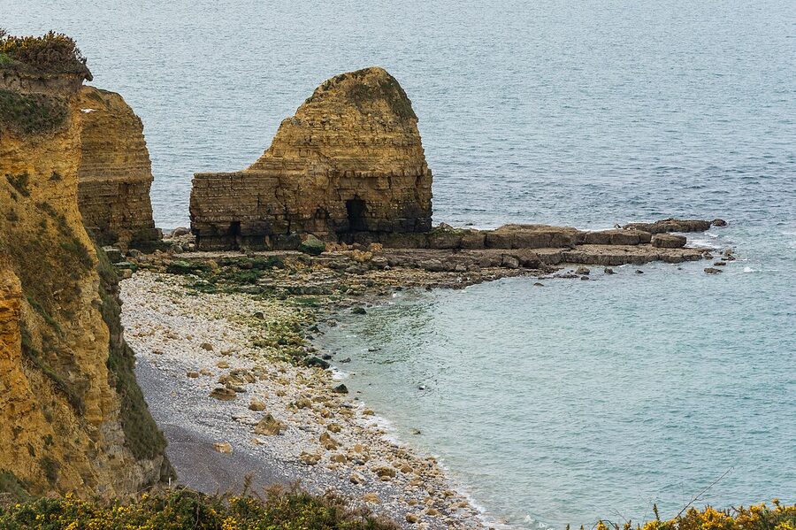 Aerial view of Pointe du Hoc showing bomb craters and bunkers