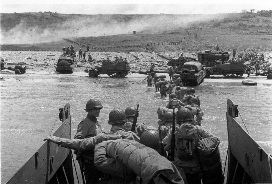 US troops wading ashore from a Higgins LCVP landing craft at Omaha Beach 1944