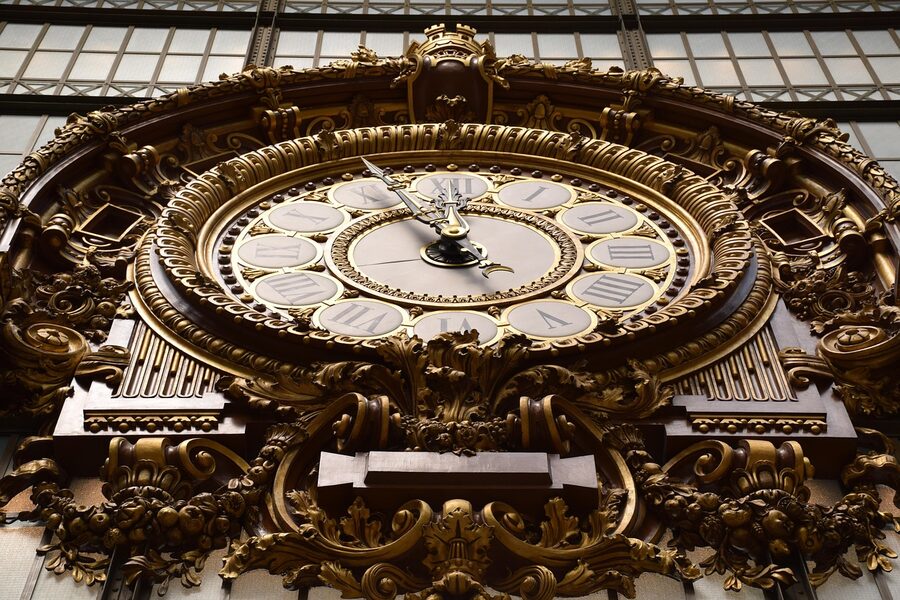 Iconic Musee d'Orsay clock window with Paris view through it