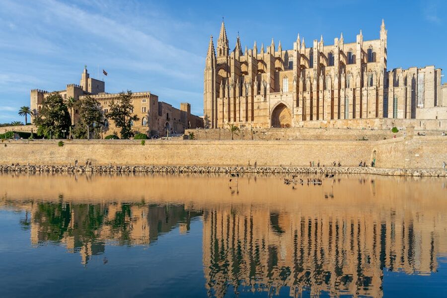 Palma Cathedral reflected in calm water