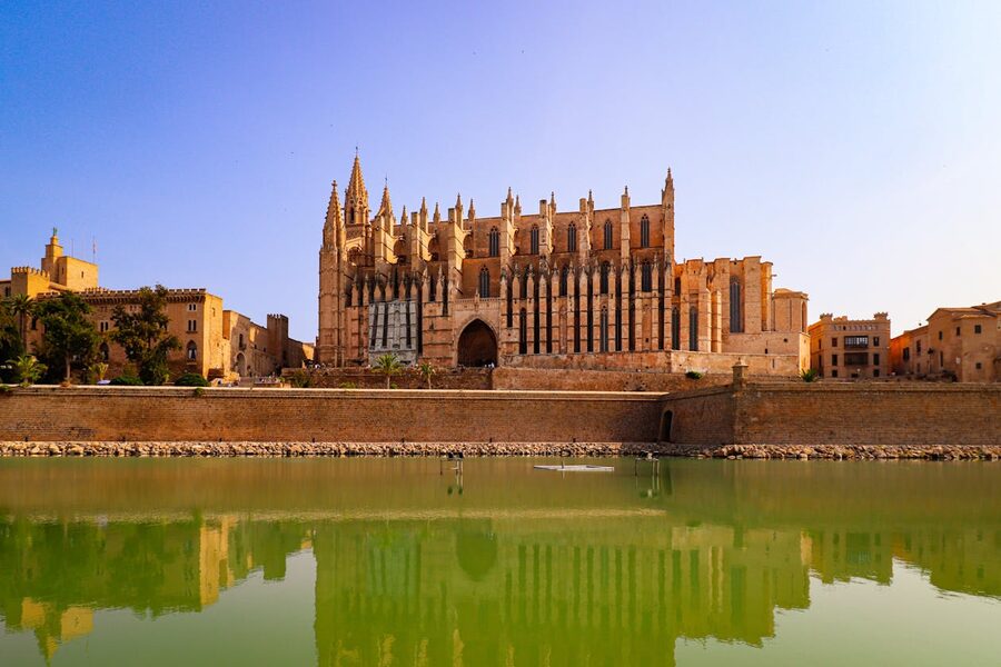 Palma cathedral reflected in water on Palma skyline