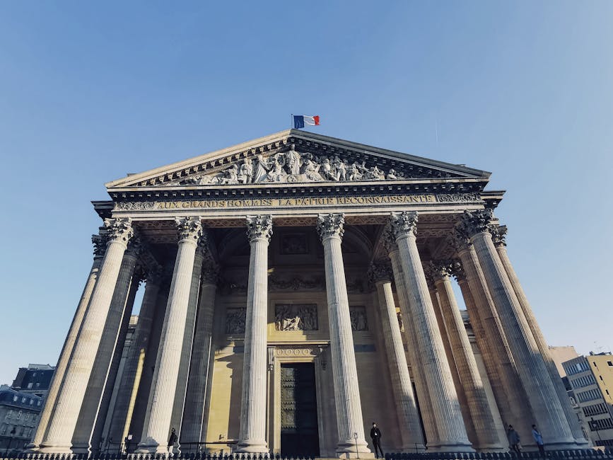 Panthéon Paris low-angle view showing the columns and pediment under clear sky