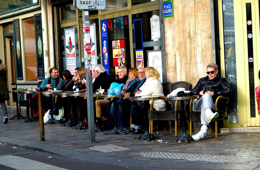 Paris corner cafe with traditional French facade