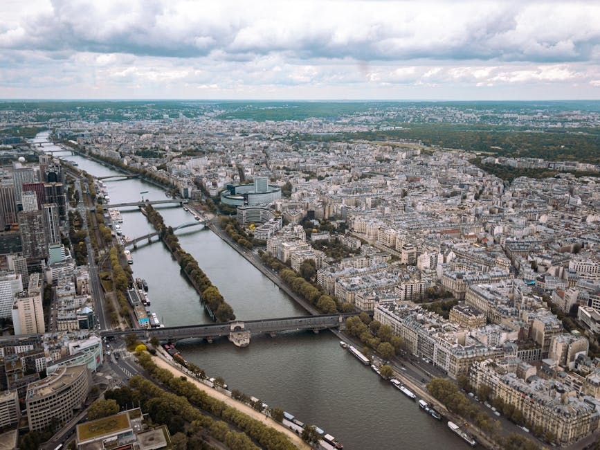 Aerial view of Paris with the Seine River and rooftops