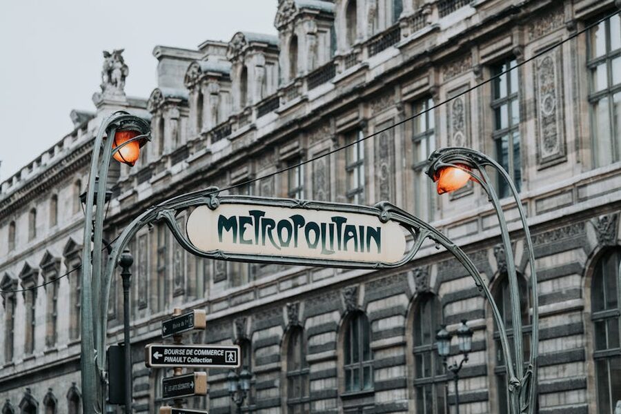 Art Nouveau Paris Métro entrance with iron canopy