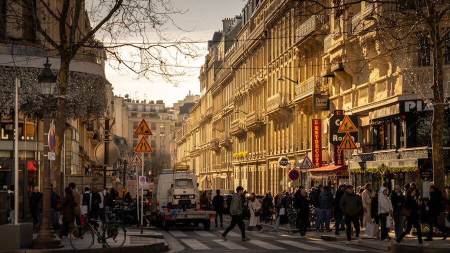 Busy Paris street scene with locals walking
