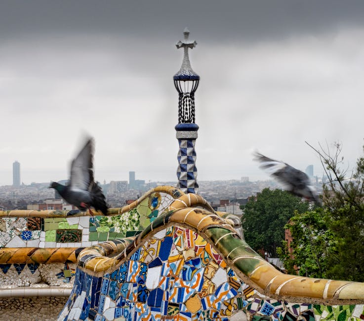 Park Guell mosaic with pigeons in flight Barcelona