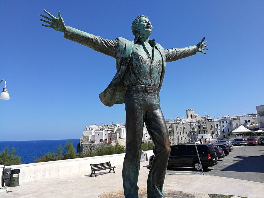 Domenico Modugno Volare statue Polignano seafront