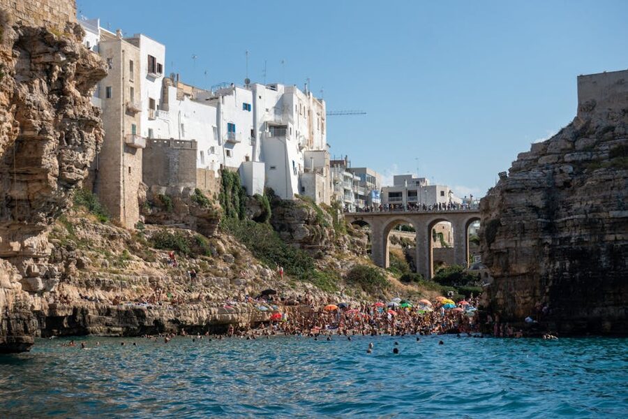 Swimmers at Cala Porto Polignano in summer