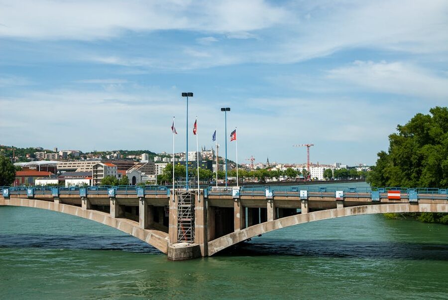 Pont Pasteur over the Rhone with city flags, Lyon