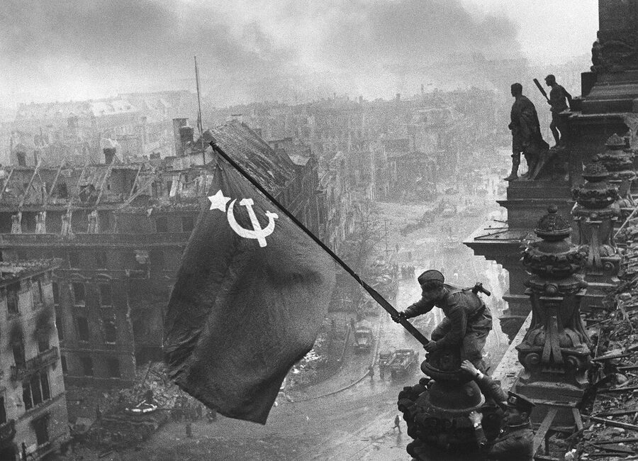 Yevgeny Khaldei photograph of a Soviet soldier raising the flag over the Reichstag in 1945