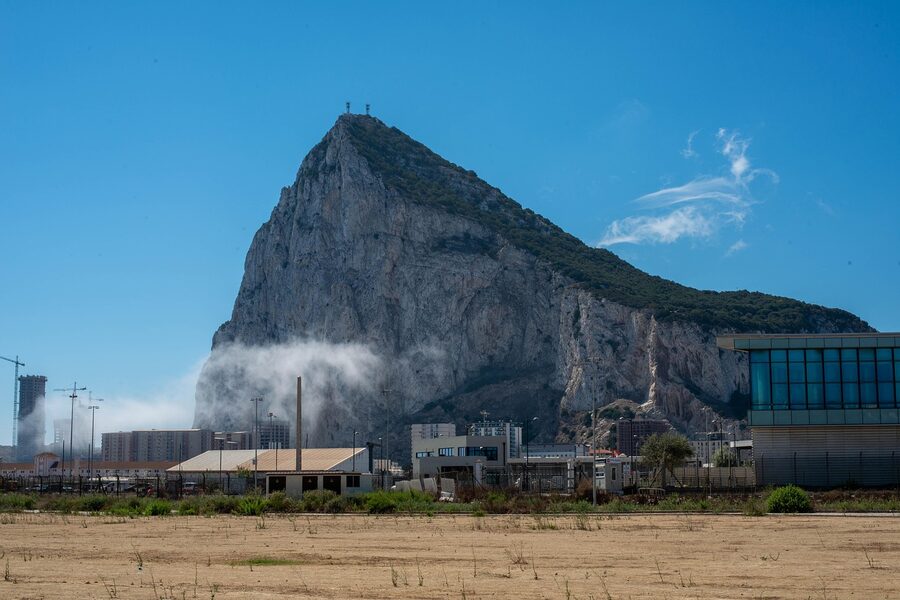 Rock of Gibraltar towering above town buildings